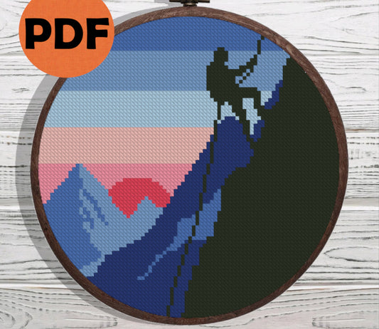 Sunset rock climbing cross stitch pattern